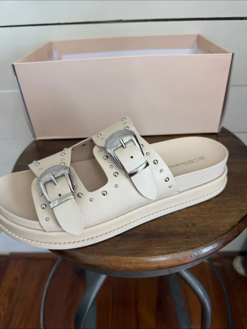 BCBGeneration Ivory Slide Sandals with Silver Buckles